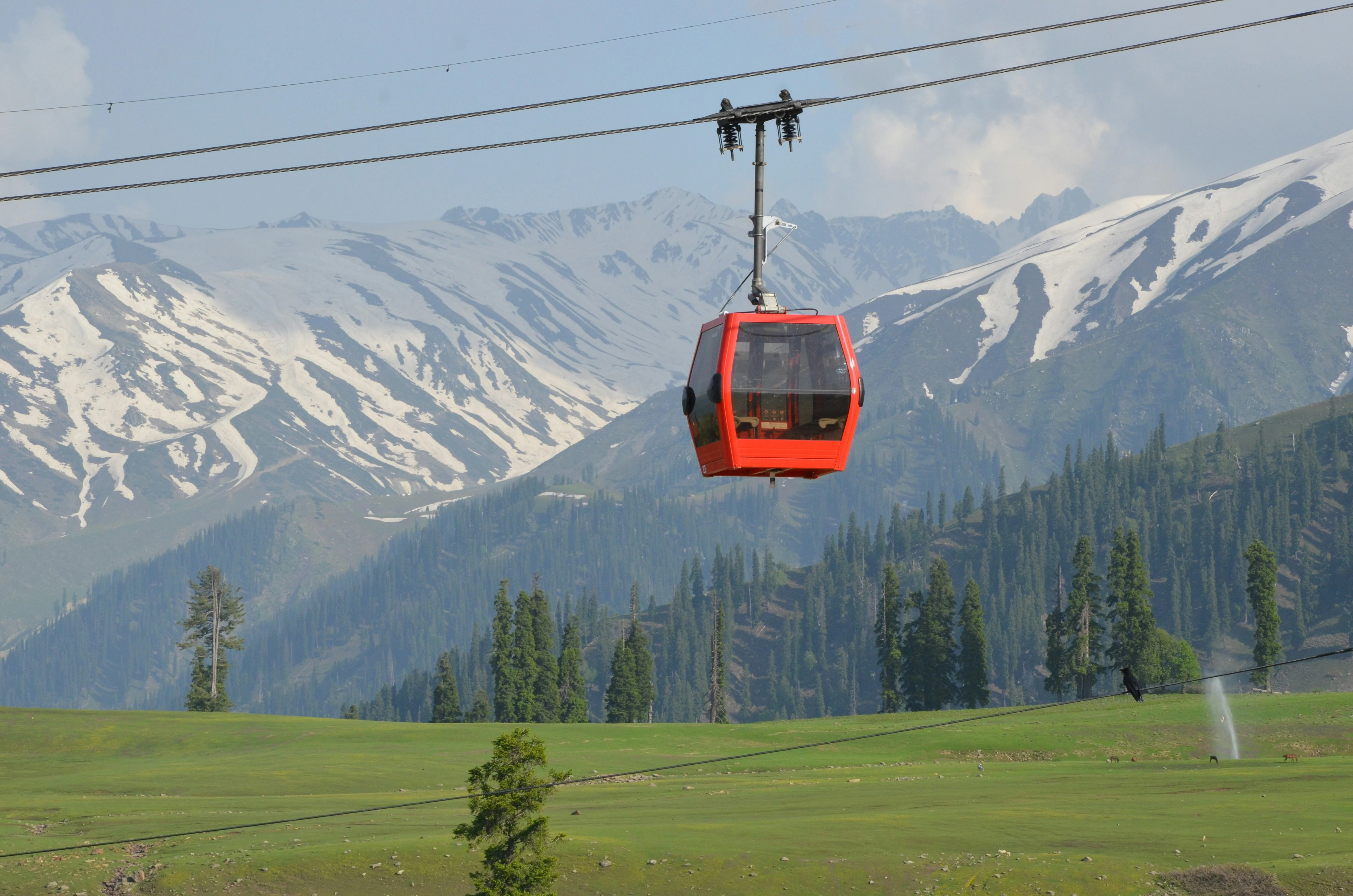 Gulmarg Gondola cable car with snow mountains